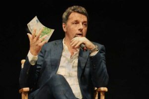 Matteo Renzi in un fotomontaggio lancia via 100 euro